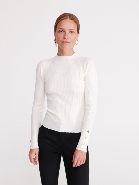 Sweater with buttons on the sleeves