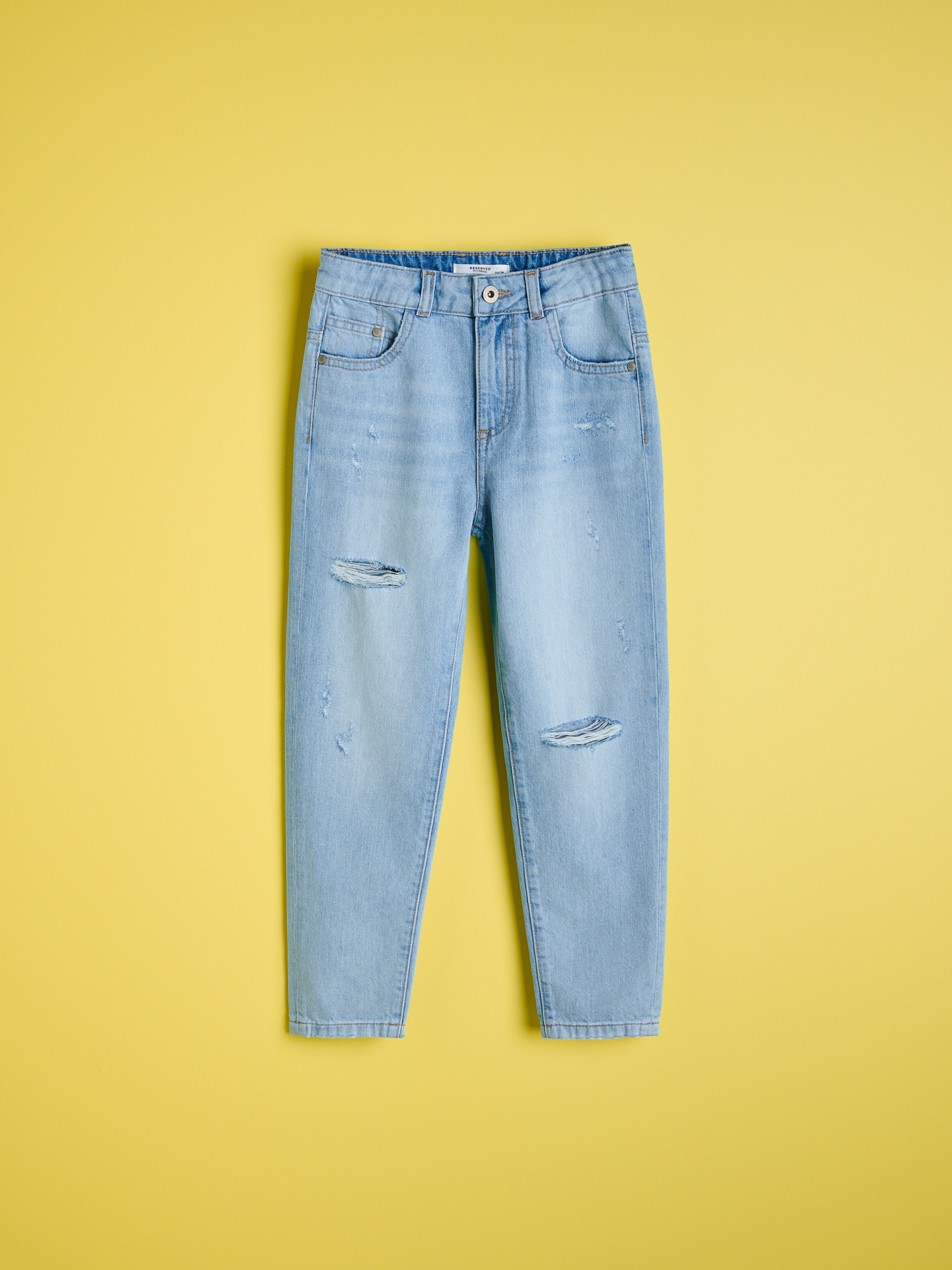 Roztrhané bavlnené džínsy