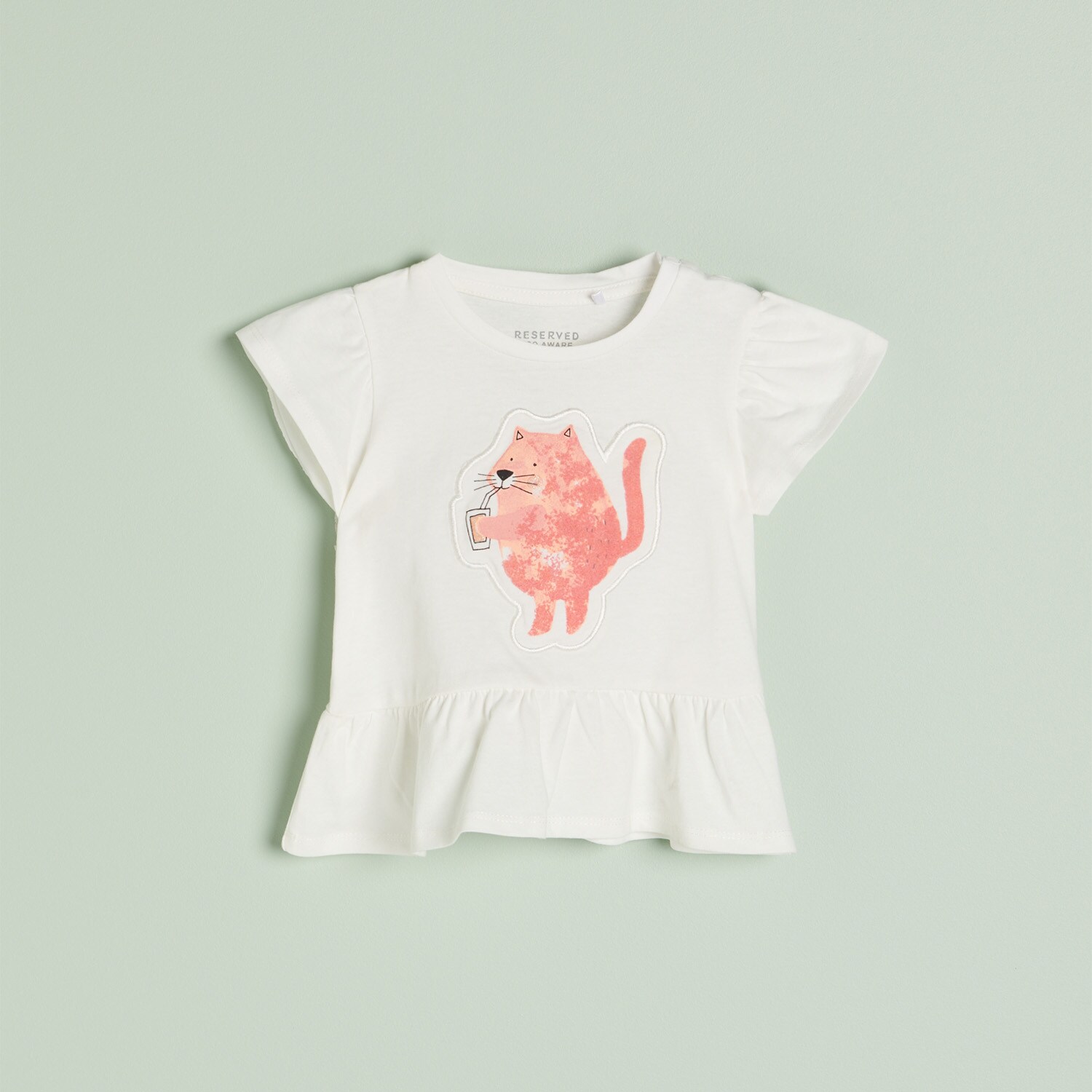 Bavlnené tričko s volánom a potlačou