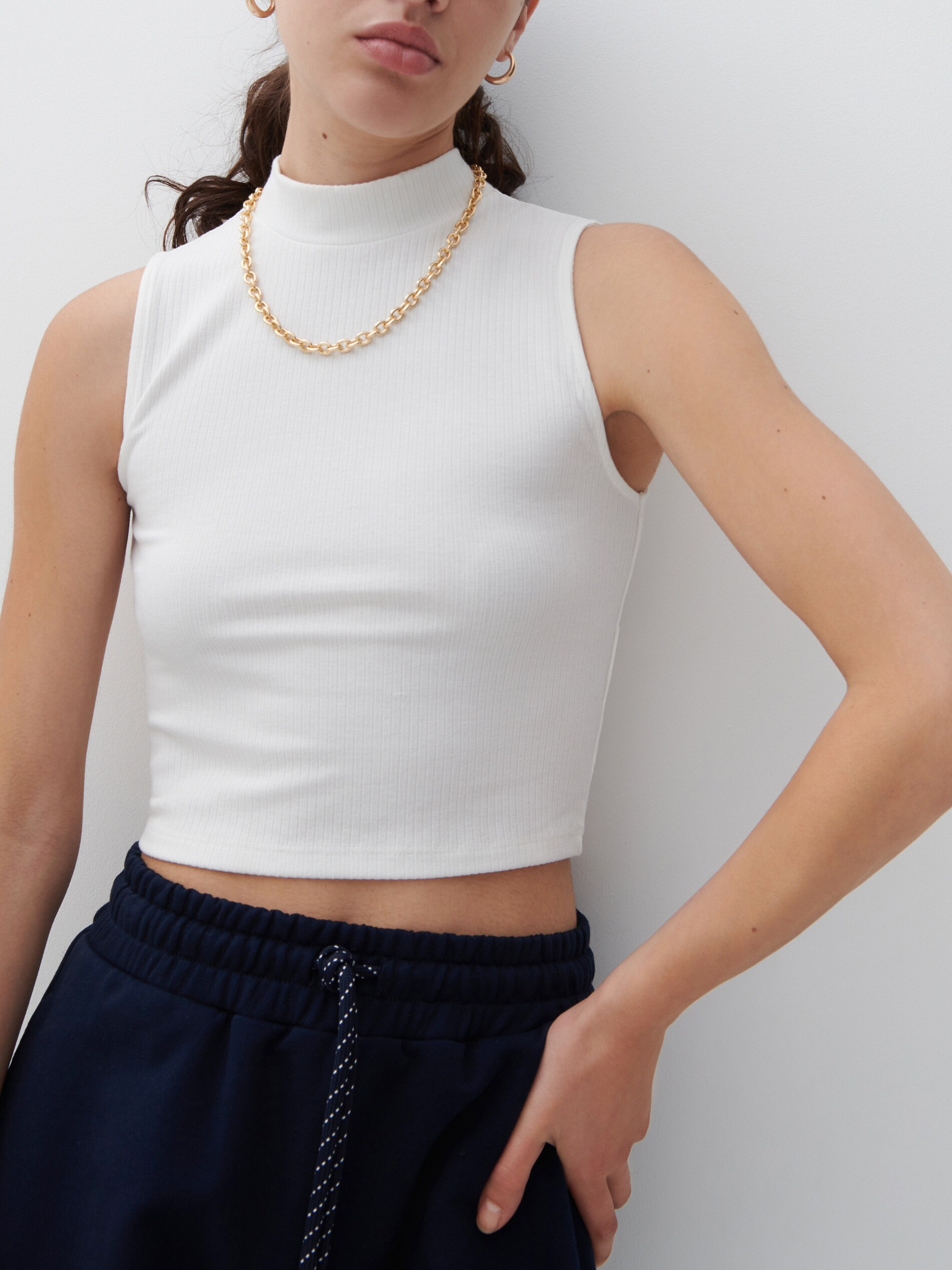 Top z prúžkovaného úpletu