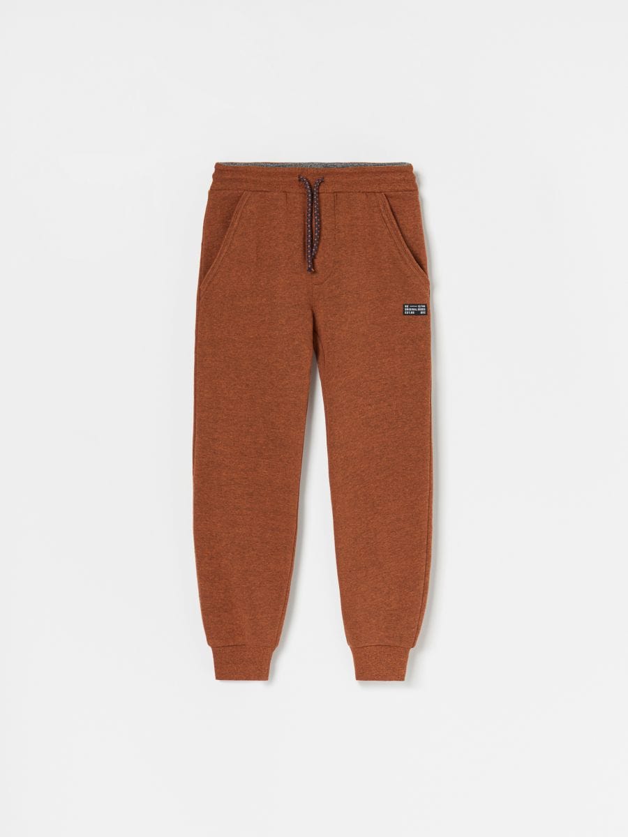 orange tracksuit bottoms