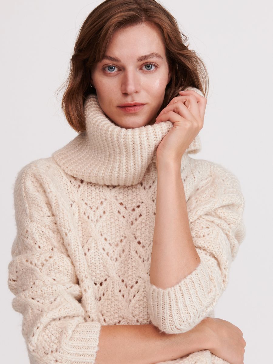 nude roll neck jumper