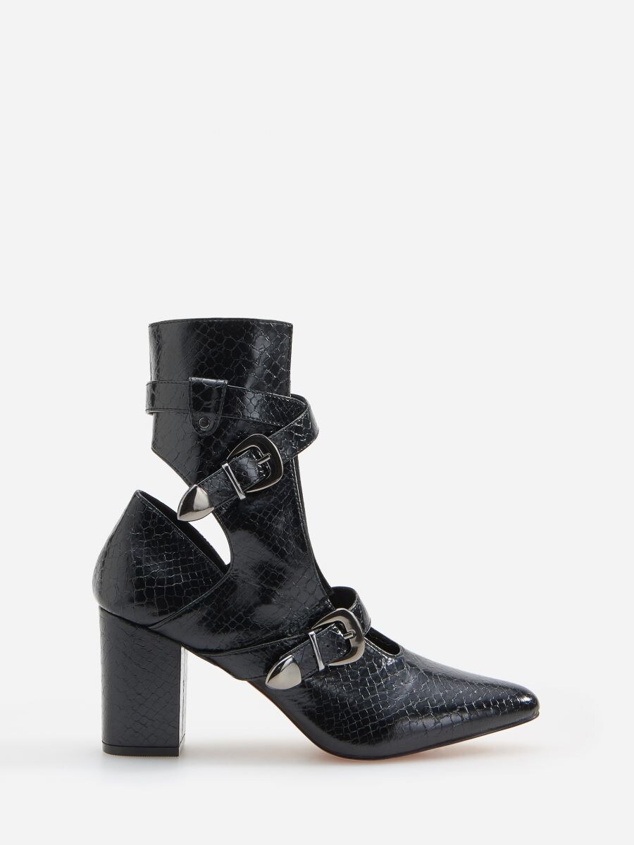 black cut out boots