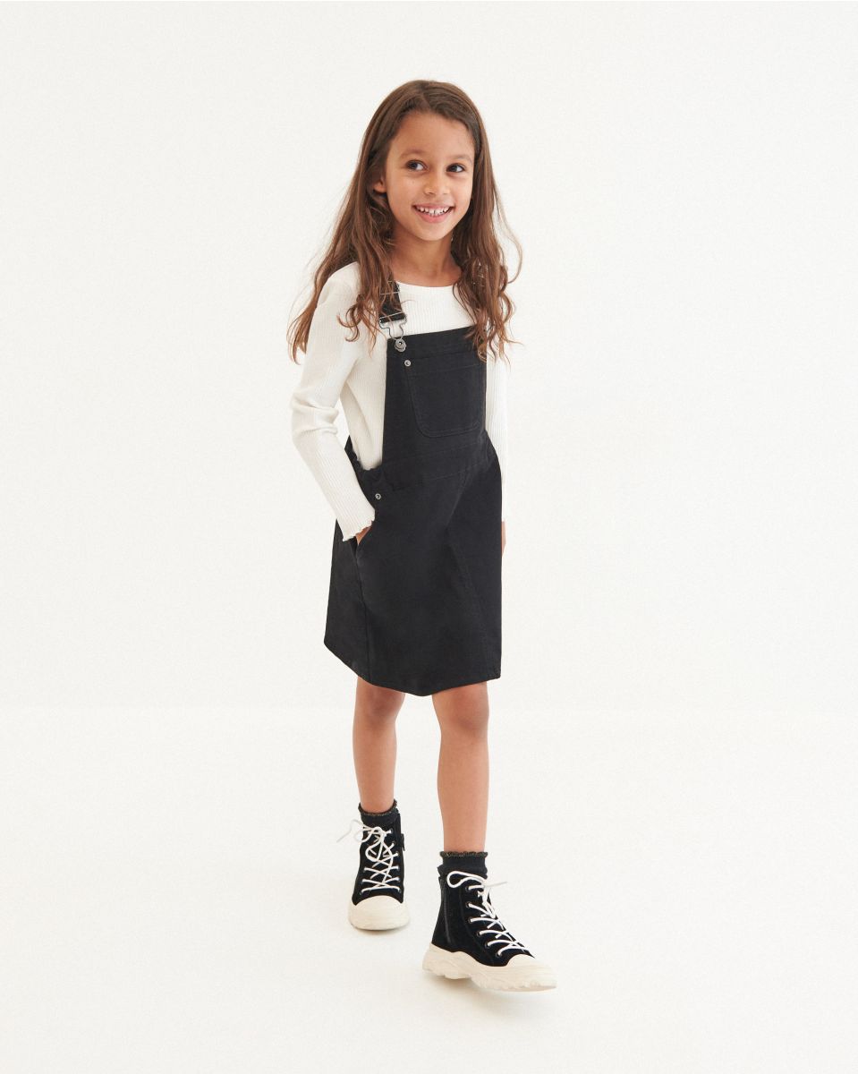 black skirt dungarees